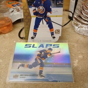 Hockey Trading Card with Blue and Orange Uniform